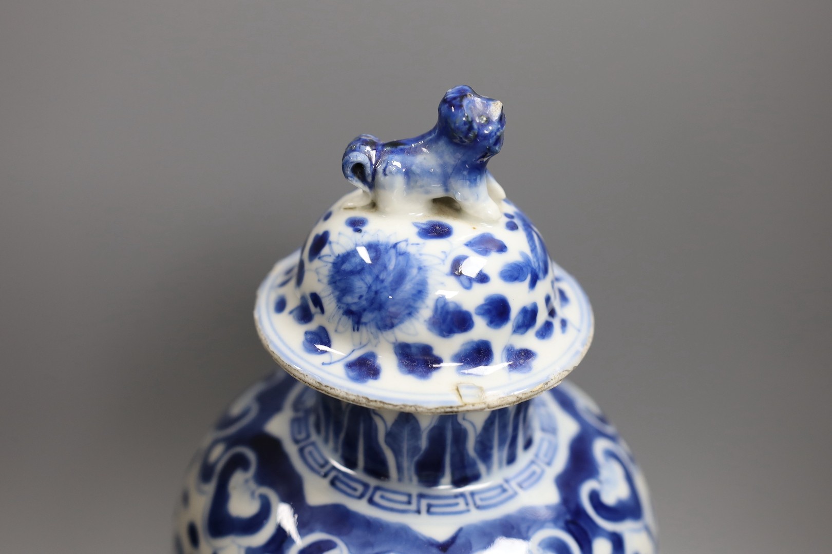 A Chinese blue and white 'dragon' vase and cover, Kangxi mark but 19th century. 33cm